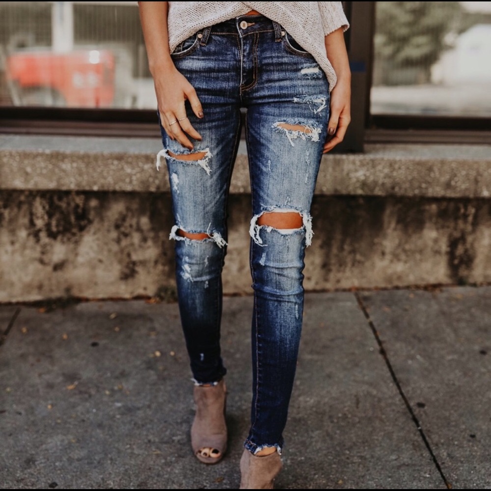 Distressed skinny ankle jeans in dark wash